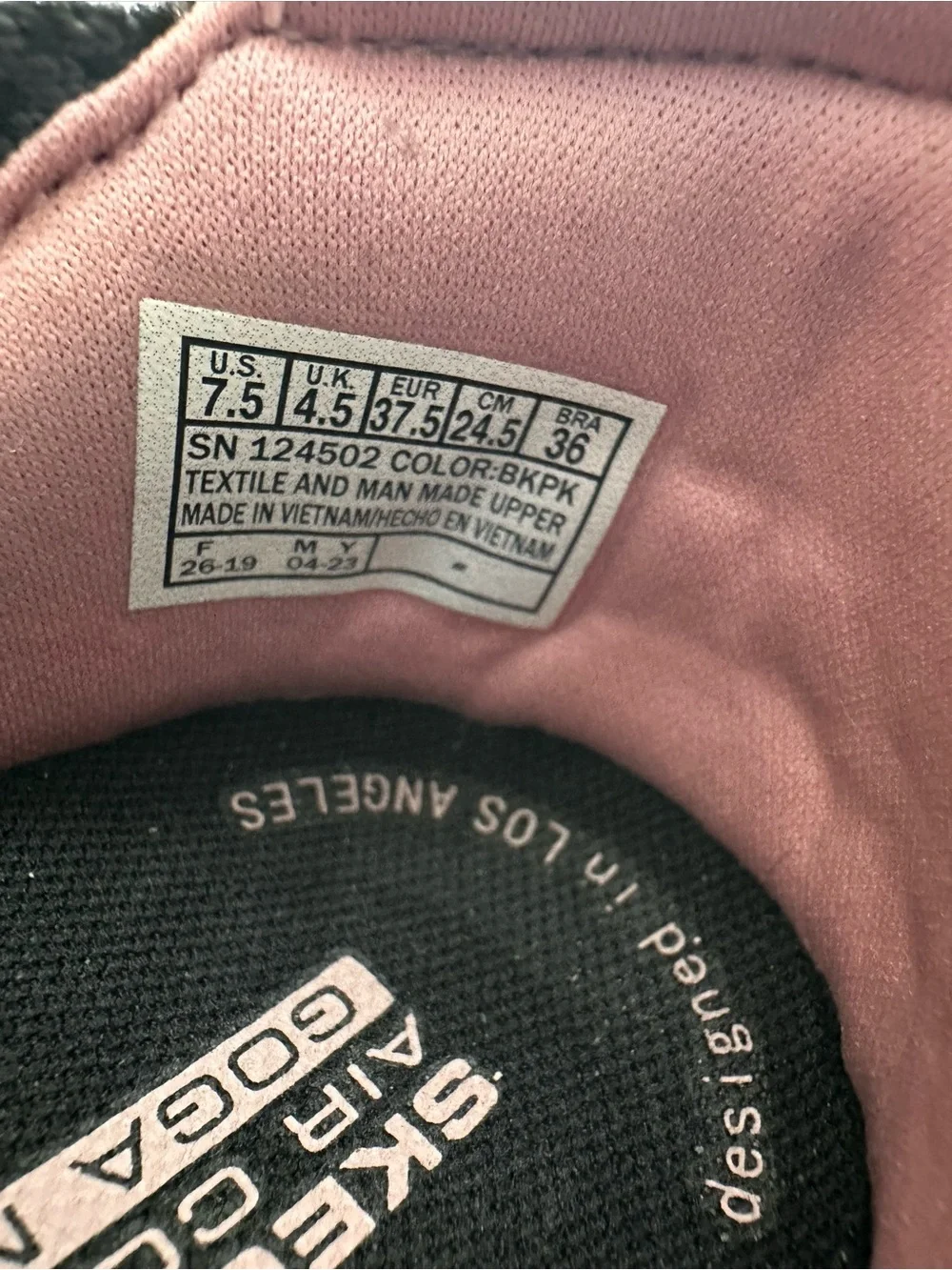 Skechers Women’s Black Glimmer Slip-On Sneakers with Pink Lining